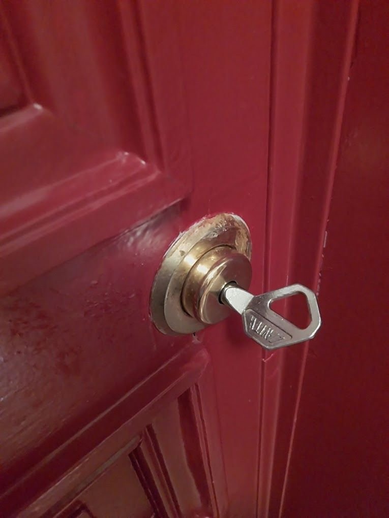 Lock cylinder with key on a Paris apartment door